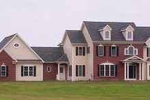 Colonial Custom Home with Brick and Siding