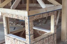 Decorative Dormer Roof Framing Mock-Up Inside Construction Site