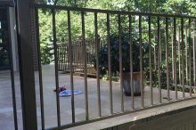 Elevated Stone Deck with Modern Railings