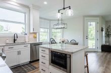 Bright Kitchen Island and Breakfast Area – Ogden, NY Home