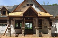 Timber Frame Porch and Roof Framing on New Luxury Home