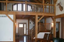 Rustic Timber Frame Living Room With Vaulted Ceilings