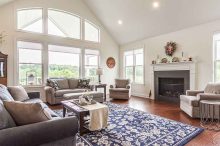 Vaulted Ceiling Living Room with Custom Arch Windows